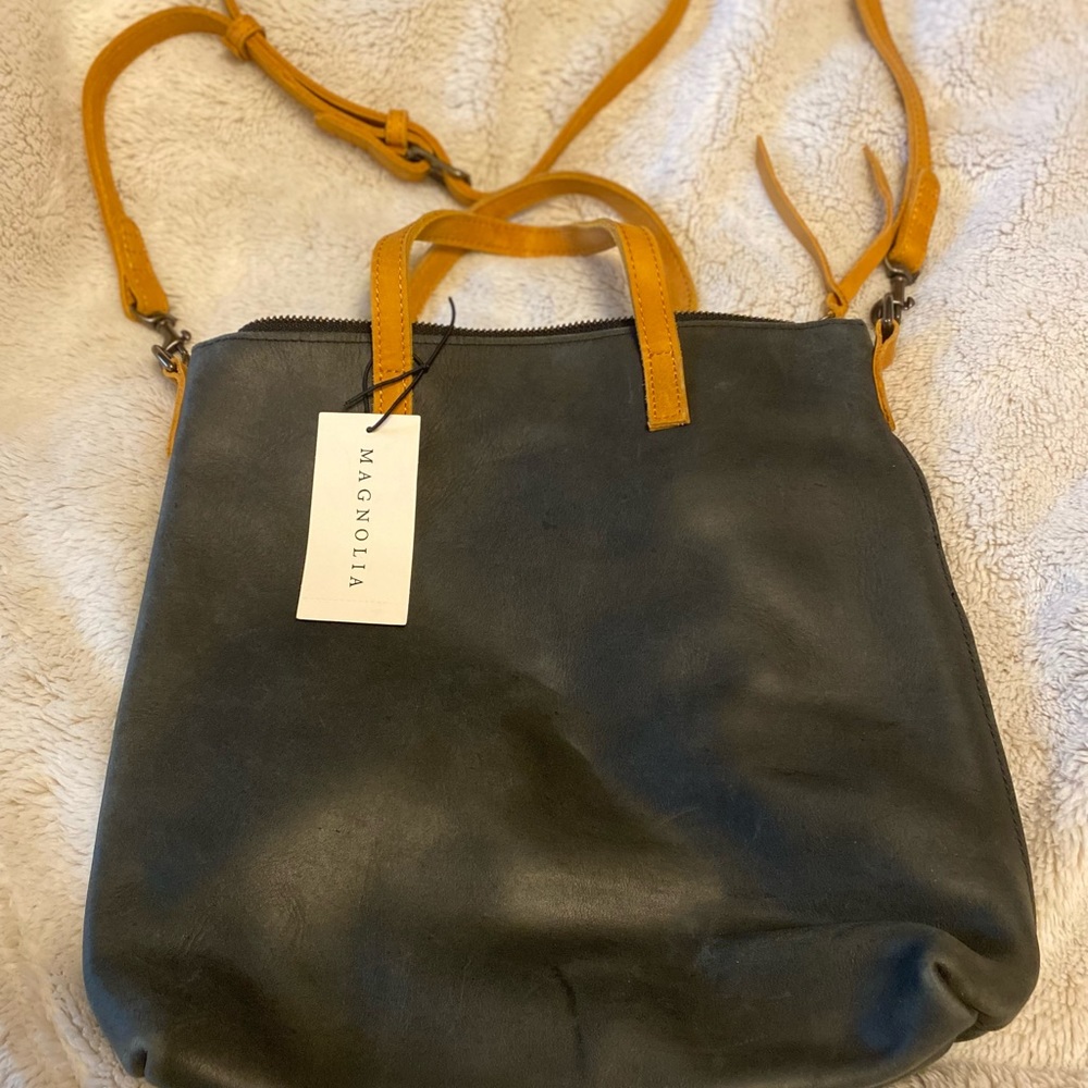 Black leather crossbody bag.
